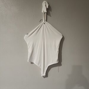 Brand new cotton bodysuit with wrap around neck and open back